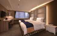 Kamar Tidur 3 Green World Hotels ZhongXiao