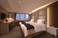 Kamar Tidur Green World Hotels ZhongXiao