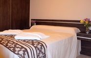 Kamar Tidur 4 Nubes Apart Hotel