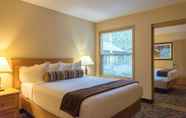 Bedroom 4 Whispering Woods Resort by VRI Americas