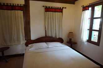 Kamar Tidur 4 Oui's Guesthouse