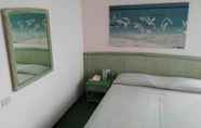 Kamar Tidur 4 American Hotel