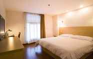 Kamar Tidur 4 Motel 168 Sinan Road