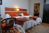 Bedroom Rio Arriba Suites Apartments y Resto