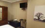 Bedroom 5 Aerotropolis Guest Lodge