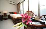 Kamar Tidur 4 Amami Resort Thida Moon