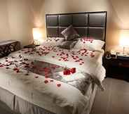 Bilik Tidur 4 Towlan Hotel Suites
