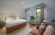 ห้องนอน 5 Factors Inn & Cottage