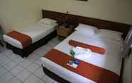 Bilik Tidur 7 Huon Gulf Hotel & Apartments