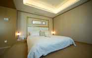 Kamar Tidur 4 Holiday Wuyang Hotel Hangzhou