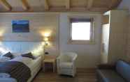Bedroom 6 Ecohotel Chalet des Alpes