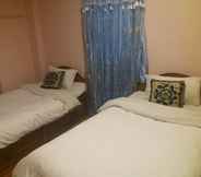 Kamar Tidur 2 King's Land Hotel