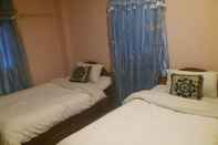 Kamar Tidur King's Land Hotel