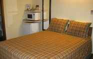 Bedroom 7 Maple Leaf Motel