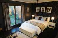 Kamar Tidur Georgie's Boutique B&B