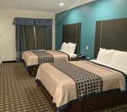 Bedroom 6 Regency Inn and Suites