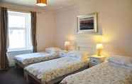 Kamar Tidur 5 Corran House Guest House & Hostel