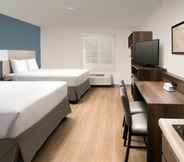 Bedroom 5 WoodSpring Suites Baltimore White Marsh - Nottingham