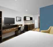 Bedroom 2 WoodSpring Suites Baltimore White Marsh - Nottingham