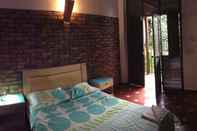 ห้องนอน Aluna Hostel B&B