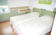 Bedroom 6 ibis budget Lyon Caluire Cite Internationale