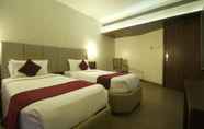 Bedroom 7 Central Beacon Hotel Surat