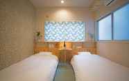 Kamar Tidur 2 Guest House Denchi - Hostel