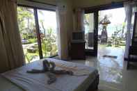 Kamar Tidur Segara Wangi Beach Cottages