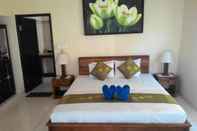 Bedroom Segara Wangi Beach Cottages