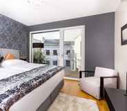 Kamar Tidur 2 Abieshomes Serviced Apartments - Votivpark