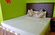 Kamar Tidur 5 C & L Suites Inn