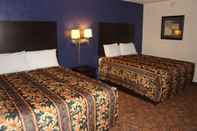 Bedroom Coratel Inn & Suites by Jasper Waite Park