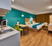 Kamar Tidur 3 City Express Suites by Marriott Tijuana Rio