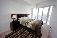 Bedroom NAPA Furnished Suites - Square One