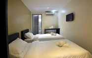 Kamar Tidur 3 Swiss Cottage Hotel