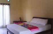 Kamar Tidur 4 Ulunsuwi Guesthouse