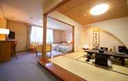 Phòng ngủ 7 Yufuin Hotel Shuhokan