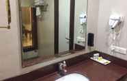 In-room Bathroom 6 Leela Grande Hotel