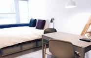 Kamar Tidur 6 CPH Studio Hotel