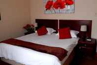 Kamar Tidur Oak Rest Guesthouse