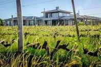 Exterior Sunrise and Sunset Apartments at Domaine Coutelier