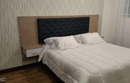 Kamar Tidur 4 Hotel Suiza Aparta Suites