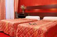 Bedroom Hotel Camelia International