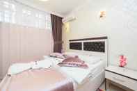 Kamar Tidur Bright Apart Hotel