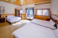 Bedroom Huansan Hotel
