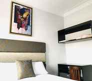 Bilik Tidur 4 Larq'a Park Rooms