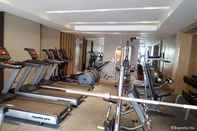 Fitness Center Shell Residences Apartment by Homebound