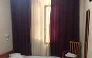 ห้องนอน 4 Ikaros Hotel