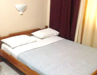 Kamar Tidur 2 Ikaros Hotel