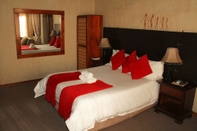 Kamar Tidur Kuruman Inn by Country Hotels